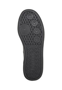 Semelle de chaussure noire avec des motifs circulaires et en losange, et le mot "REPLAY" moulé au centre.