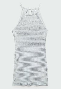 Top en argent avec un tissu transparent et des motifs en vagues de paillettes. Design à col halter avec un fermoir à nouer à l'arrière.