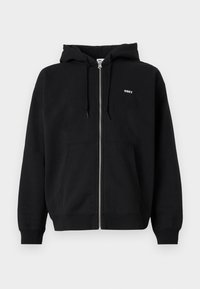 Black zip-up hoodie made of soft fabric, featuring a front kangaroo pocket and a small white "OBEY" logo on the chest. Adjustable drawstring hood.