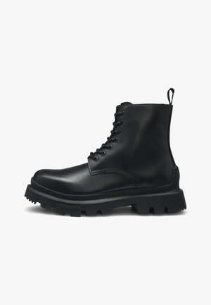 Black leather ankle boot with round toe, lace-up front, pull tab, and rugged rubber outsole. Smooth texture with minimal stitching details.