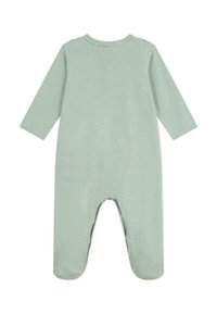 Il body a maniche lunghe a strisce verdi presenta un collo rotondo, gambe lunghe e una parte inferiore aperta per facilitare il cambio del pannolino. Materiale in cotone morbido.