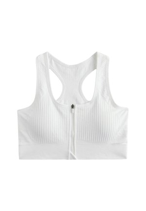 White ribbed sports bra with front zipper and racerback design, made of stretch fabric for support and comfort.