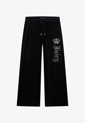 Zwarte wijde broek met een taillekoord, voorzien van een kroon van strass-steentjes en de tekst "Juicy" op het rechterdijbeen.