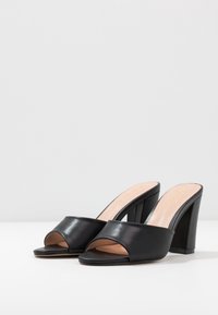 Madden Girl Mules de tacón - black