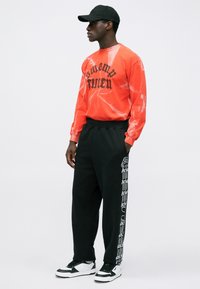 Aries UNISEX czarny