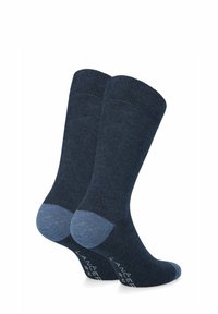Ciemnoniebieskie skarpetki o teksturowanym splocie, z jaśniejszymi niebieskimi akcentami na palcach i pięcie. Nadrukowane logo na podeszwie.
