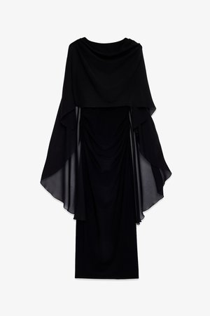 Črna obleka z tekočim prosojnim materialom, ki je narejen nad oprijetim bodycon slojem. Ima okroglo izreza in naborke pri pasu.