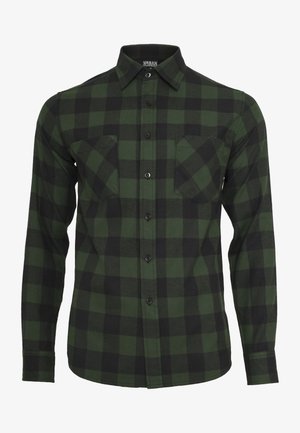 Zöld-fekete kockás flanel ing hosszú ujjakkal, gombos záródással, két mellkasi zsebbel és klasszikus gallér kialakítással.