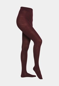 Collant bordeaux realizzati in materiale morbido e elastico, con vita alta e texture liscia, progettati per adattarsi perfettamente alle gambe.