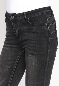 Koroshi Vaqueros bootcut - denim black