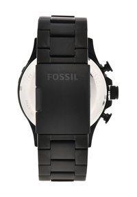 Montre noire en métal avec un bracelet à maillons, finition texturée et boîtier rond. Logo présent sur le fermoir, plusieurs boutons de commande sur le côté.