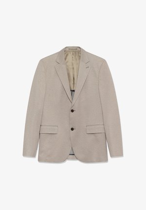 Beežikarva jakk tekstuurse kangaga, millel on kahe nupuga kinnis, sälklape ja kaks esist taskut. Sisemisel vooderel on heledam värv.