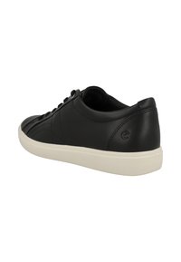 Black leather sneaker with a smooth finish, features minimal stitching, lace-up design, and a white rubber sole, showcasing a simple, modern aesthetic.