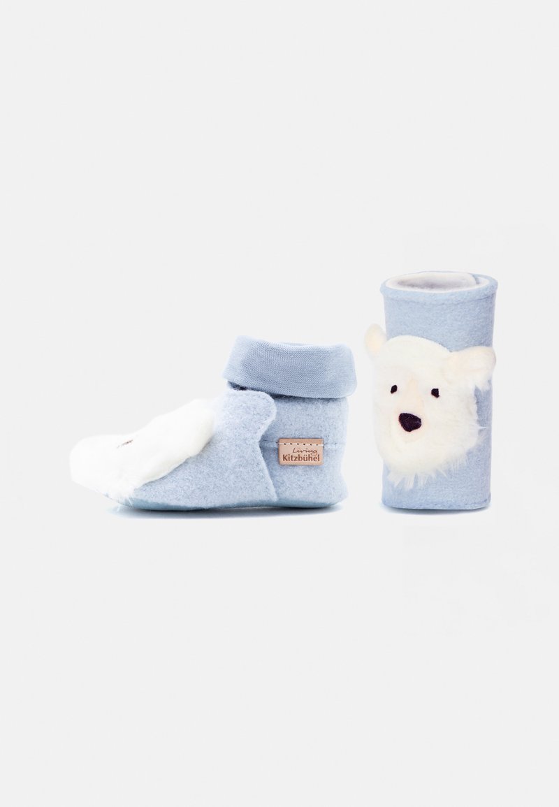 Light blue baby booties with white bear face decoration and soft fabric, one bootie upright and one on its side.