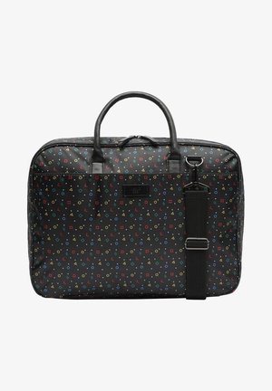 Czarna torba z geometrycznym wzorem w kolorach czerwonym, żółtym, zielonym i niebieskim. Zawiera dwa uchwyty oraz odpinany pasek. Gładka tekstura.