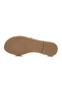 Shoe sole with a smooth, light brown rubber material. Features textured lines for grip and a small embossed logo. Size 38 indicated.