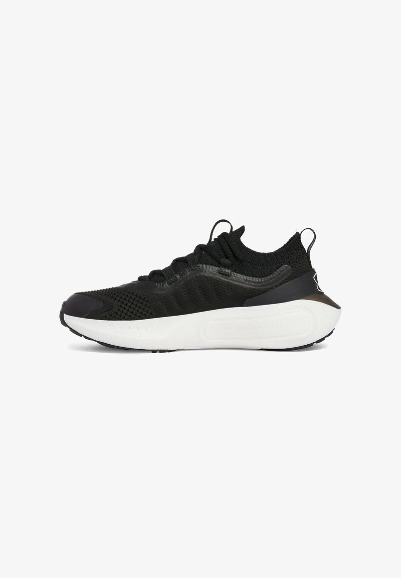 Black athletic shoes with a textured knit upper, rounded toe, and a white cushioned midsole. Features a lace-up design and back pull tab.