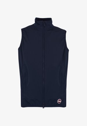 Tumši zila bez piedurknēm ar rāvējslēdzēju vestē, ar stāvošu apkakli un sānu kabatām, tuvāk apakšmalai izvietots neliels apaļš Colmar logotips.