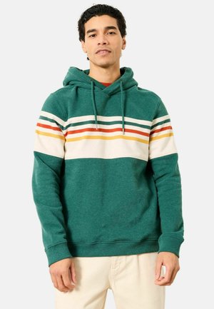 Green hooded sweatshirt with cream, orange, yellow, and blue horizontal stripes across the chest. Adjustable drawstrings and ribbed cuffs.