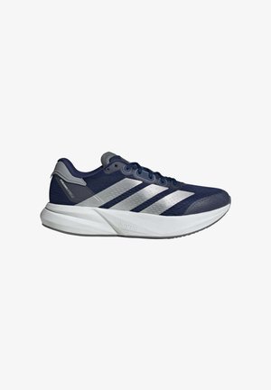 Navy running shoe with metallic silver stripes, mesh upper, gray accents, cushioned white sole, and textured detailing on the upper.