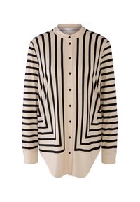 Košile s dlouhým rukávem v krémové barvě, s výraznými černými horizontálními a vertikálními pruhy, s knoflíkovou légou vpředu a zaobleným límečkem. Hladká textura látky.