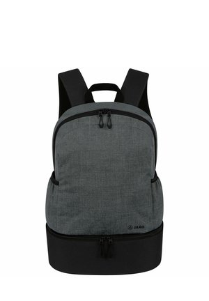 Gray fabric backpack with a spacious compartment, a black bottom, adjustable straps, and dual zipper pulls on a rounded top.