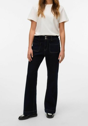 VIVIANNE TAILLE AUSGESTELLT - Flared Jeans - dark blue denim