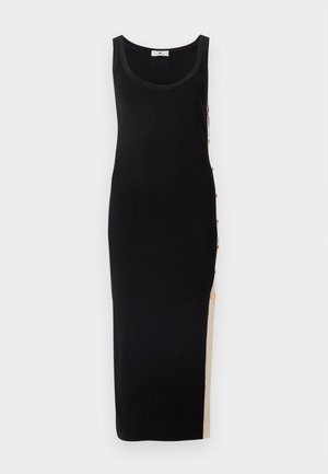 Musta, hihaton mekko, jossa on istuva malli, kullanväriset napit sivussa ja kontrastia luova beige kaitale helmassa.