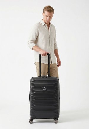 Delsey Paris, METEOR 4 ROLLEN TROLLEY 68 CM MIT DEHNFALTE UNISEX - Valise - deep black