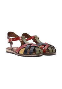 Strappy sandals made of multicolored leather with red, green, yellow, and black bands. Features an ankle strap and a flat wooden sole.