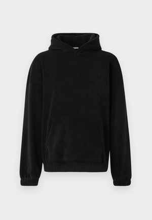 Black hooded sweatshirt in soft fleece material, featuring a front pocket, long sleeves, and ribbed cuffs. Minimalist design, no visible patterns.