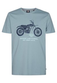 Světle modré bavlněné tričko s tmavě modrou grafikou motocykla a textem: "Bayside Lane Florida Key West U.S.A." Krátké rukávy, kulatý výstřih.
