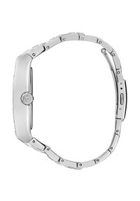 Sudraba krāsas nerūsējošā tērauda viedpulkstenis ar taisnstūra formu, saist�ītu siksnu un apaļu pogu sānos. Gluda tekstūra, pulēta virsma.