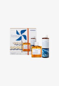 Il set regalo Korres Kyma include un'eau de toilette da 100 ml e un gel doccia da 260 ml. Il packaging presenta vortici blu e oro con una fascia arancione.