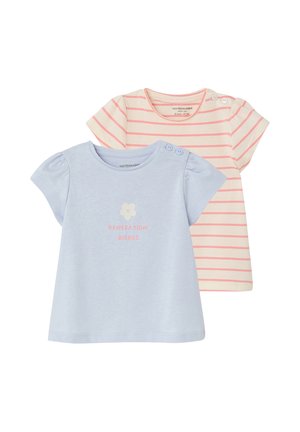 Two baby T-shirts, one light blue with "Generation Bisous" and a flower, and one cream with pink horizontal stripes; both have shoulder buttons.