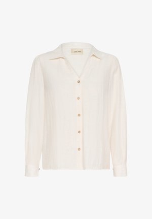 Ivory košulja dugih rukava od teksturirane tkanine, s V-izrezom, gumbima na zatvaranju i opuštenim krojem s manžetama. Vidljiva oznaka marke "CREAM".