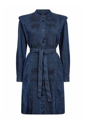 Tumesinises toonis teksakleit, millel on mandariinkrae, ees nupud, volditud detailid ja vööümbrisega vöökoht. Pikkade varrukatega, mansetiga detailidega.