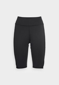 Černé krátké legíny s vysokým pasem, vyrobené z pružné, hladké látky; mají ploché švy a nejsou na nich viditelné žádné kovové prvky.