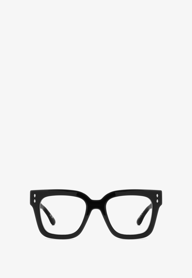Occhiali rettangolari neri con montature spesse e due puntini su ciascun lato. Lenti trasparenti e materiale plastico liscio e lucido.