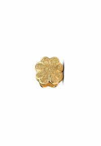 Charm in metallo color oro a forma di fiore a quattro petali con superficie texturizzata e bordi lisci, caratterizzato da una finitura lucida.