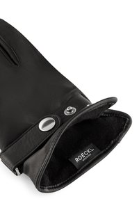Schwarzer Lederhandschuh mit strukturierter Oberfläche, ausgestattet mit einem Druckknopf und einem weichen Innenfutter. Das Etikett trägt die Aufschrift "ROECKL MÜNCHEN."