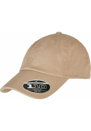 Beige cap with a curved visor, made of textured fabric. Features a black label with "FLEXFIT TECH 110" on the front for sizing adjustments.