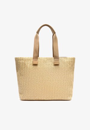 Beige geweven draagtas met twee brede stoffen handgrepen en een rechthoekige bodem, ontworpen voor het dragen van dagelijkse spullen.
