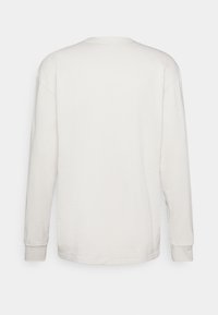 Nike Sportswear PREM ESSNTL SUST - Camisola de manga comprida - light bone/black