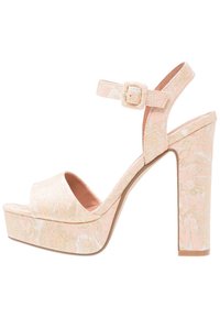 Peach floral-patterned high-heeled sandal with thick platform, ankle strap, and square buckle, side view on white background.