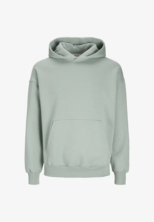 Müntroheline kapuutsiga dressipluus, mis on valmistatud pehmest puuvillasegust, ees on tasku-kangaroo, ribatrellitud vöödega ja tõmbluku kapuutsiga.