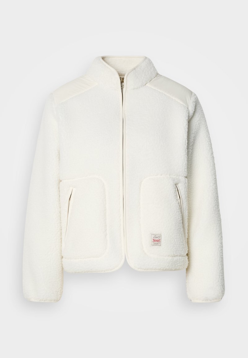 Weißer Fleece-Jacke mit strukturiertem Kragen, Reißverschluss vorne und zwei Fronttaschen. Verfügt über eine weiche Textur und kontrastierende Schulterpaneele.