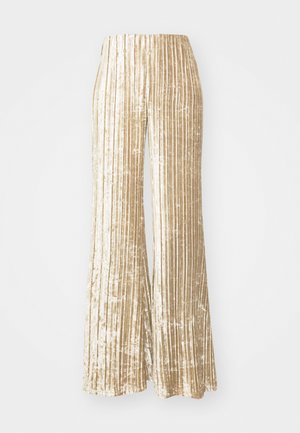 Arany bársony széles lábú nadrág, függőleges csíkokkal, magas derekú és puha, textúrált anyagból készült.