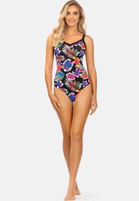 Jednoczęściowy strój kąpielowy z czarnym tłem i kolorowymi tropikalnymi wzorami liści oraz kwiatów, z solidnymi ramiączkami i dopasowanym krojem.