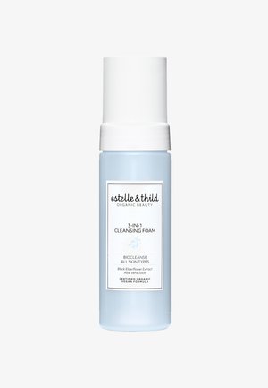 Light blue cylindrical bottle with a white pump cap. Label features black text and a small leaf graphic. Contains 3-in-1 cleansing foam.